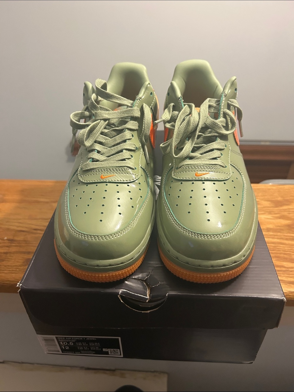 Nike Olive Green Sneakers with Orange Accents